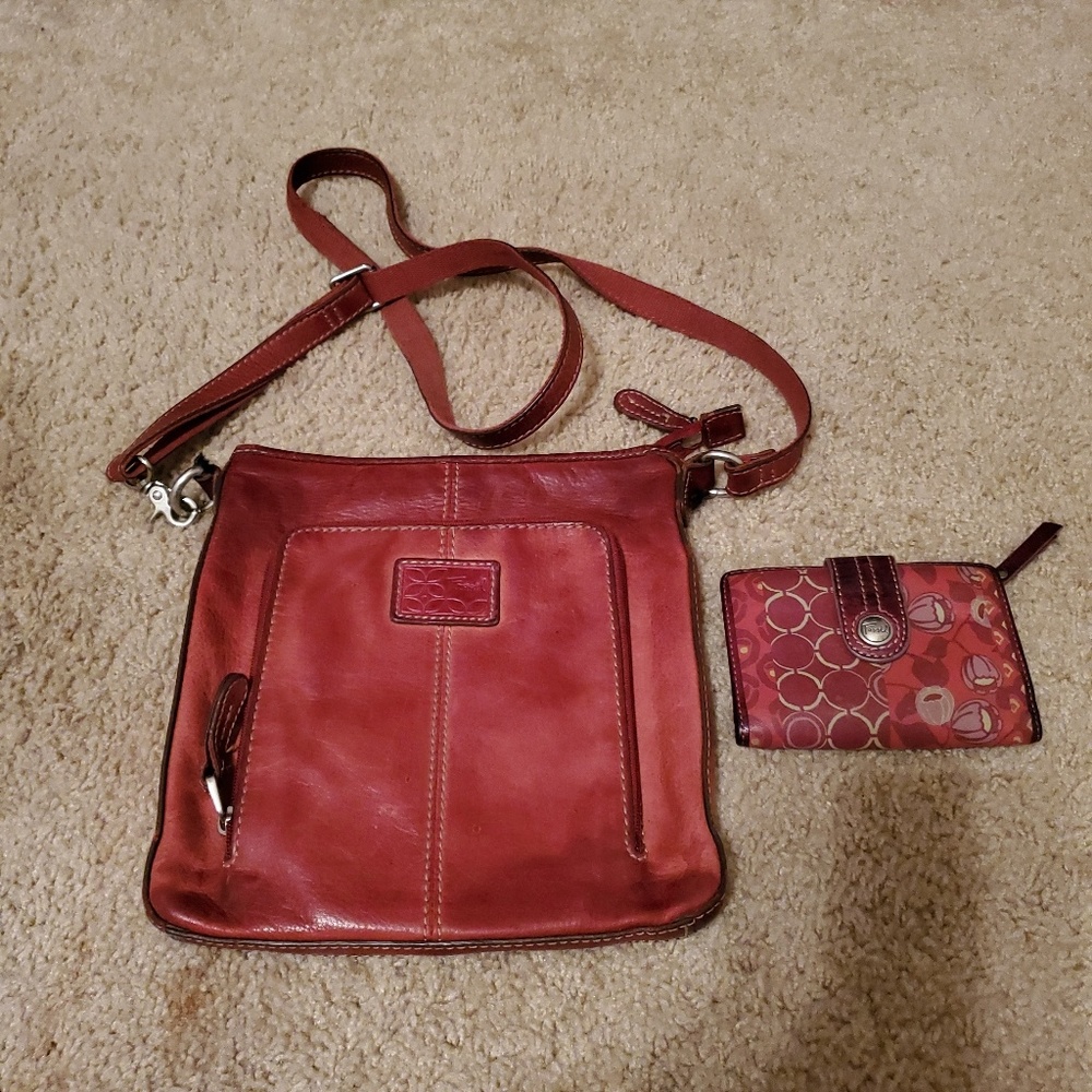 A red leather Fossil Crossbody with wallet